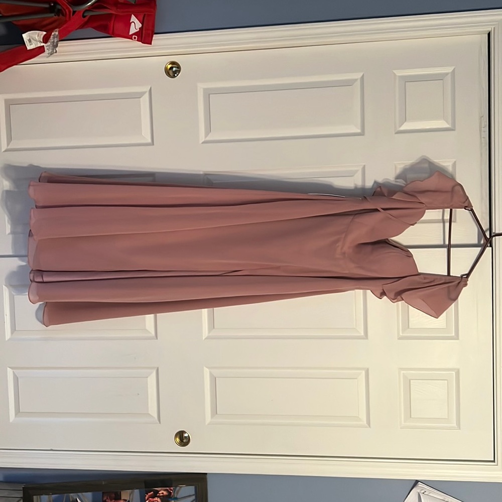 Bridesmaids dress it is dusty rose color. Nothing wrong with it.